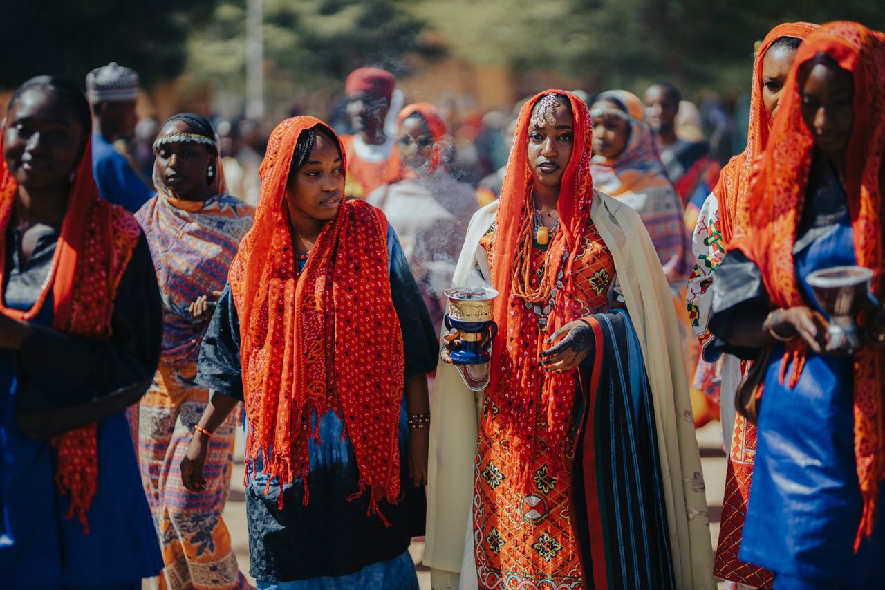 Colorful tribal gathering showcasing African heritage and traditional clothing.